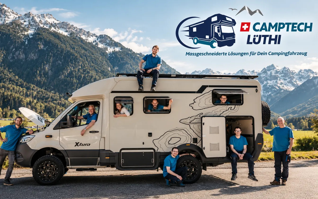 Das Team von Camptech Lüthi mit einem umgebauten Expeditionsfahrzeug vor den Berner Alpen